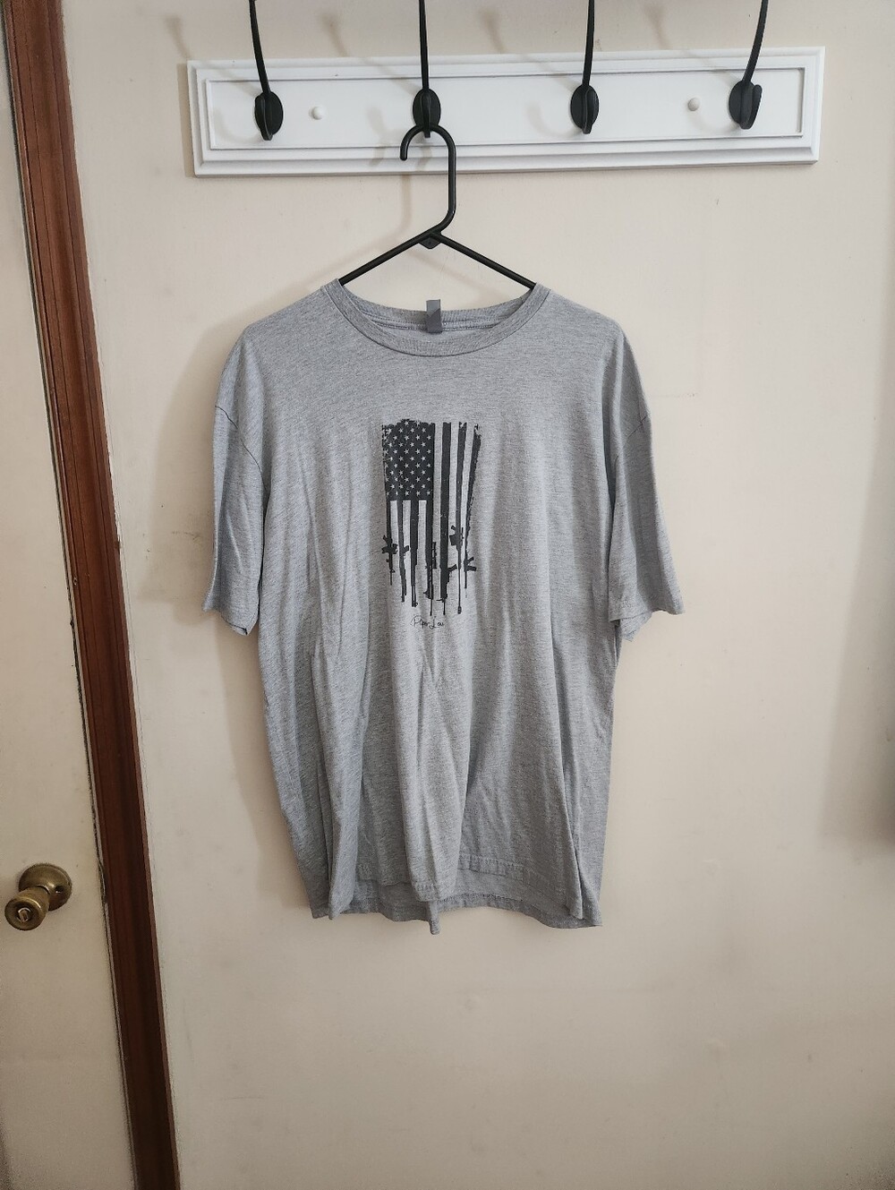 🎉 Weapons Themed Flag Tee